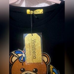 Vinizbena embellished black top